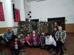 Женщины из села Ваеги закончили плетение первой маскировочной сети для участников СВО